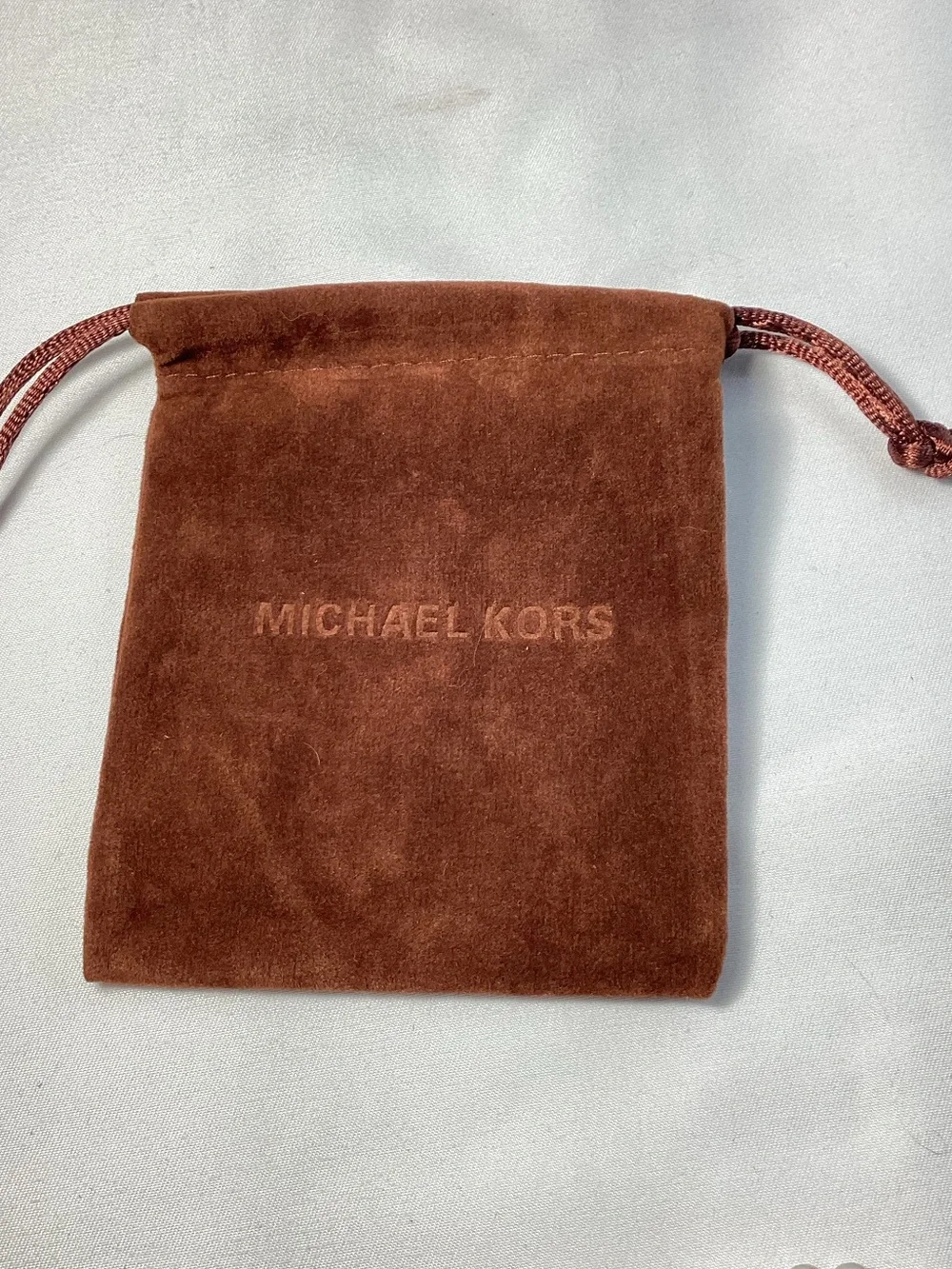 Michael Kors NWT and Dust Bag Gold-Tone Beaded Brown Suede Logo Charm Bracelet